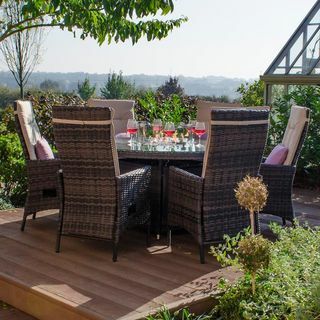 Ruxley 6 Seat Dining Set και Round Firepit Table